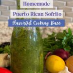 Puerto Rican Sofrito in a glass jar surrounded by ingredients.