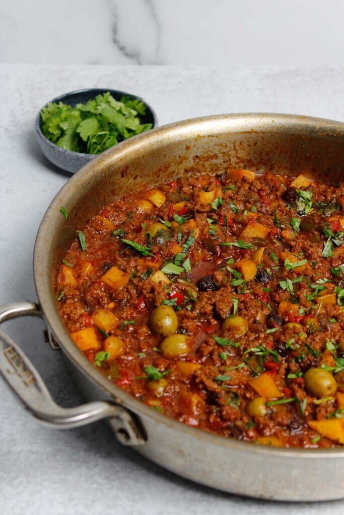 Picadillo in a large skillet.