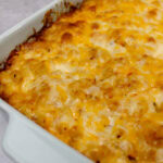 Four cheese baked macaroni and cheese in a baking dish.