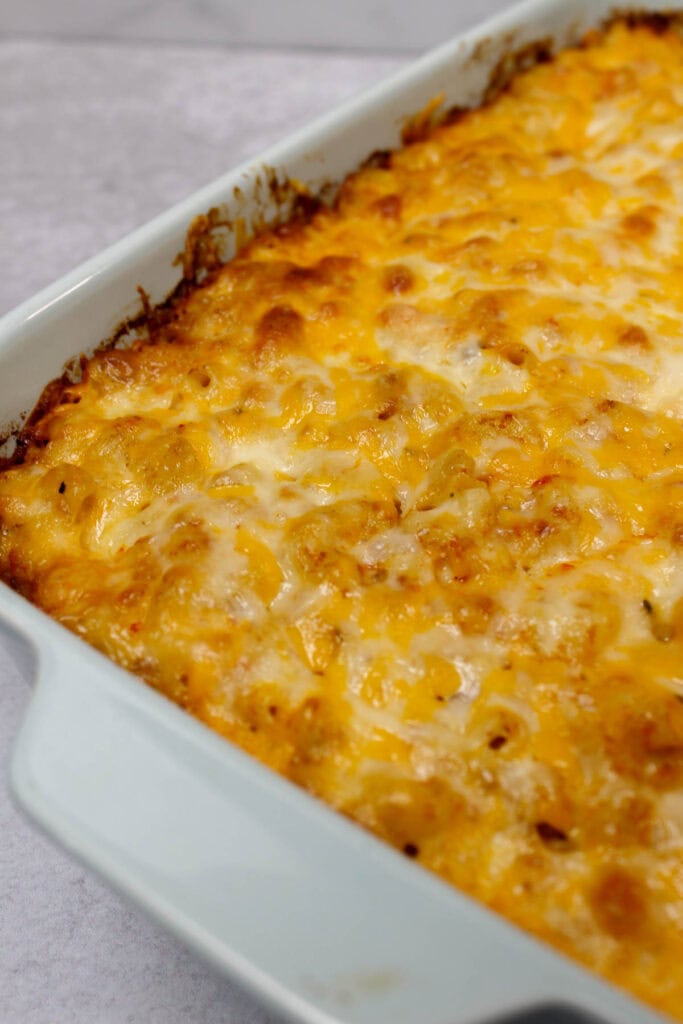 Four cheese baked macaroni and cheese in a baking dish.