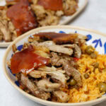 Pernil & arroz con gandules in a bowl.