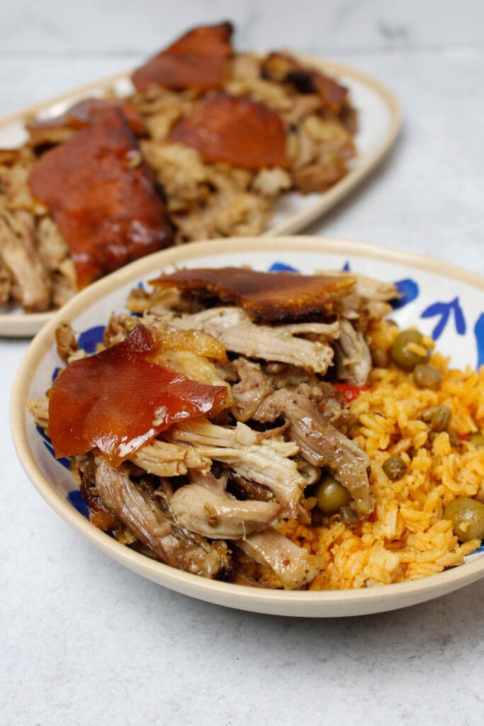 Pernil & arroz con gandules in a bowl.