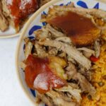 Pernil & arroz con gandules in a bowl.