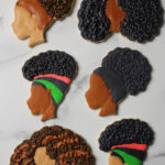 Custom decorated Black Girl Magic sugar cookies.