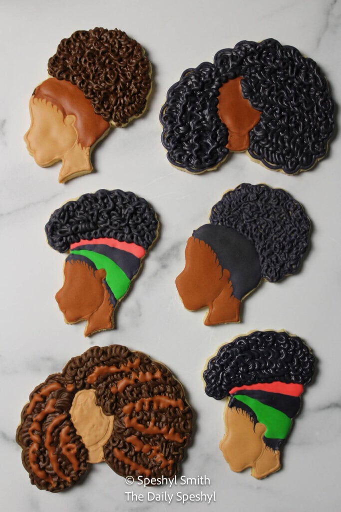 Custom decorated Black Girl Magic sugar cookies.