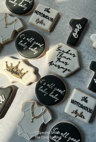 Custom decorated Notorious One themed sugar cookies.