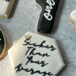 Custom decorated Notorious One themed sugar cookies.