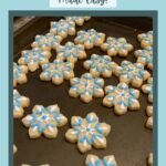 Custom decorated snowflake sugar cookies.