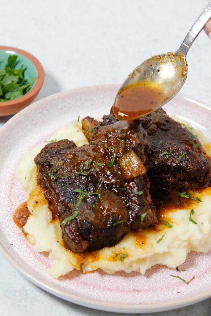 Oven Braised Short Ribs over mashed potatoes.