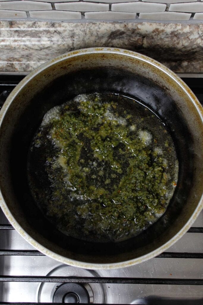 Cooking sofrito in vegetable oil.