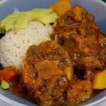 plate of rabo guisado; puerto rican oxtail stew